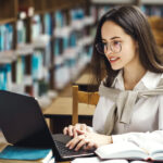 Girl Studying at the Library | Mont Rose College