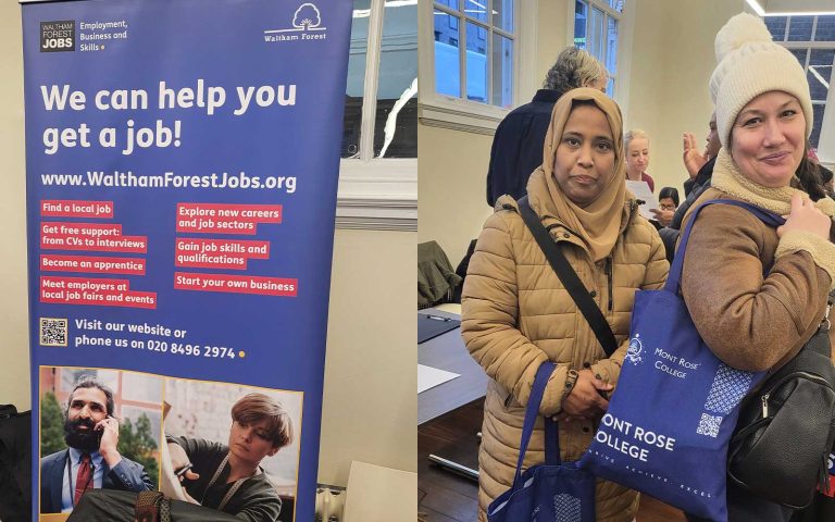 Two women holding Mont Rose College tote bags at the Waltham Forest Job Fair, standing beside a job support information banner.