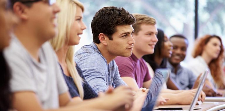 Student Support Services in HND Programs students attentively participating in classroom discussion, highlighting academic guidance, peer collaboration, and a supportive learning environment