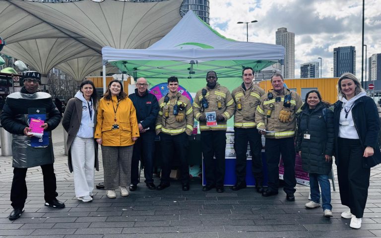 A group of firefighters and Mont Rose College representatives at the National Battery Day Awareness Event promoting battery recycling.