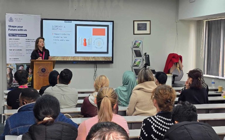 Petya Ikonomova delivering a motivational talk at Mont Rose College to a classroom of engaged students.
