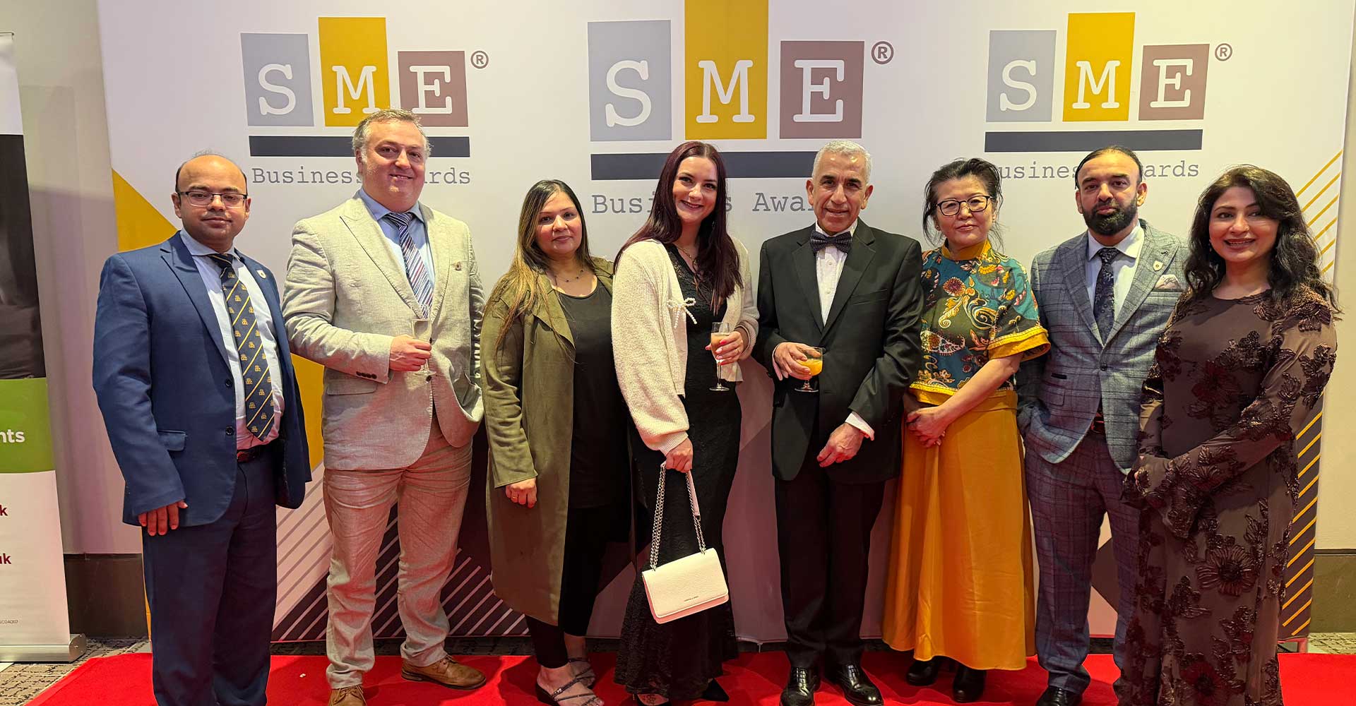 Mont Rose College team posing on the red carpet at the Mont Rose College CSR Award 2026, celebrating success at the SME Business Awards event.