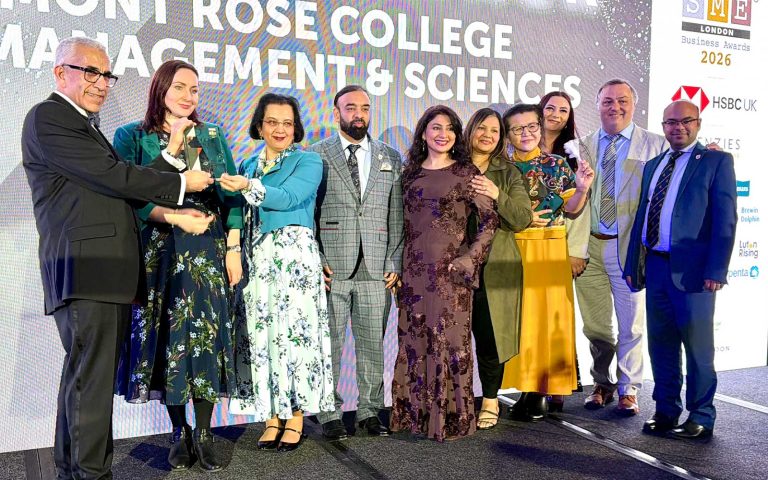 Mont Rose College team receiving recognition on stage at the Mont Rose College CSR Award 2026, celebrating achievement and community impact.