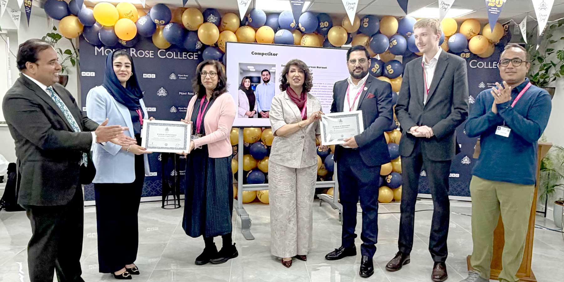 A finalist receiving an award in recognition of outstanding entrepreneurial achievement in Mont Rose College Angel Business Competition 2026