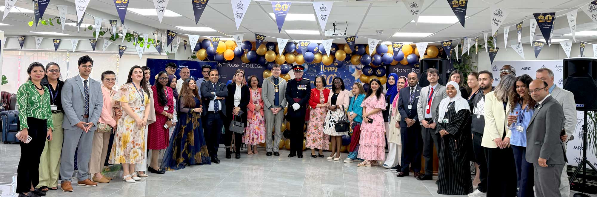 Guests, students and staff celebrating the 20th Anniversary of Mont Rose College